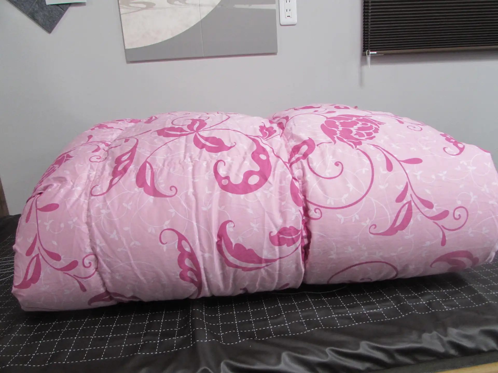 ピンク色の羽毛布団