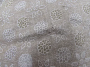 穴の開いた羽毛布団